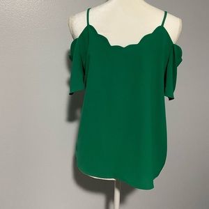 Monteau off the shoulder blouse. Green, scallop shell design around the top.